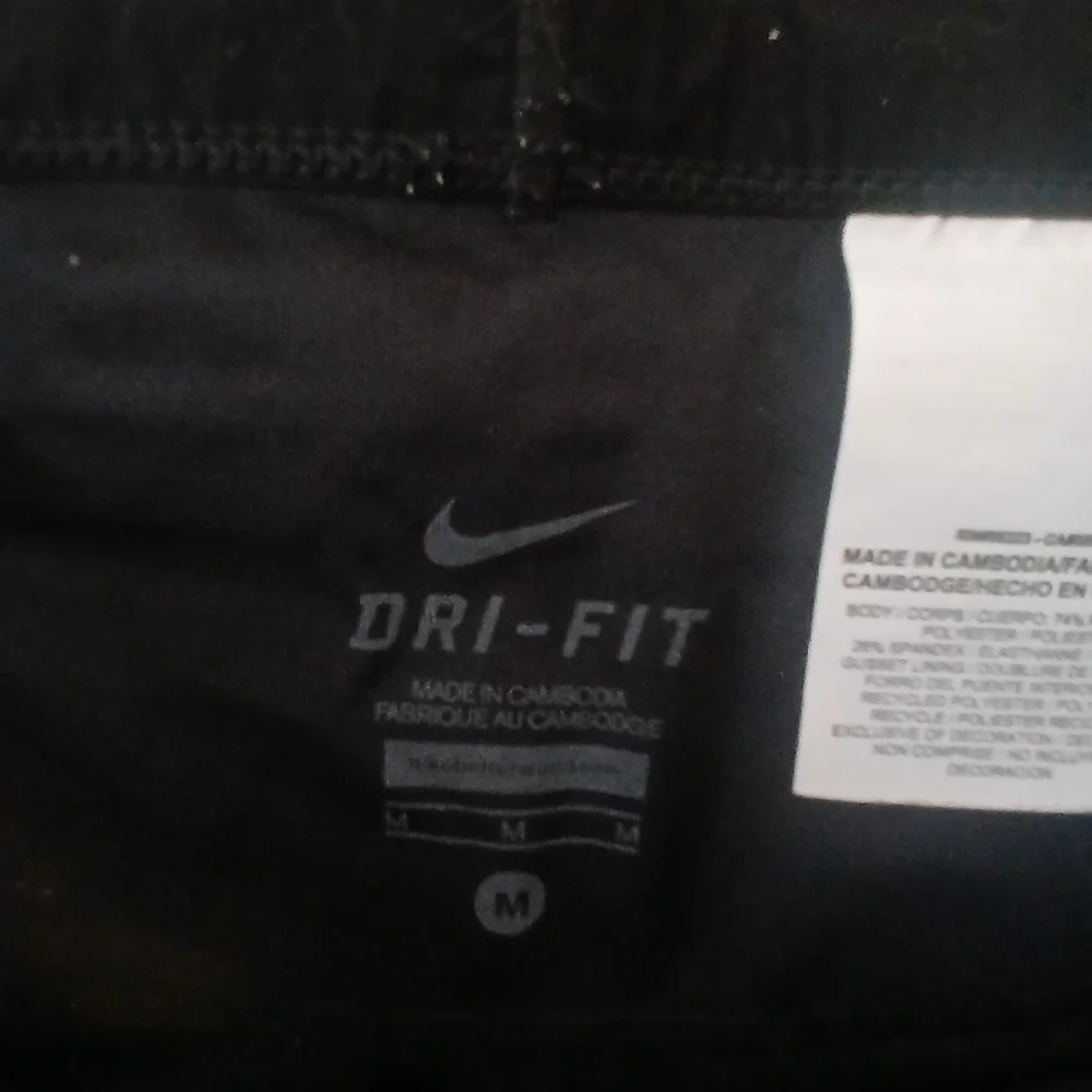Nike  Dri-Fit Running Leggings Sz Medium Colorful.